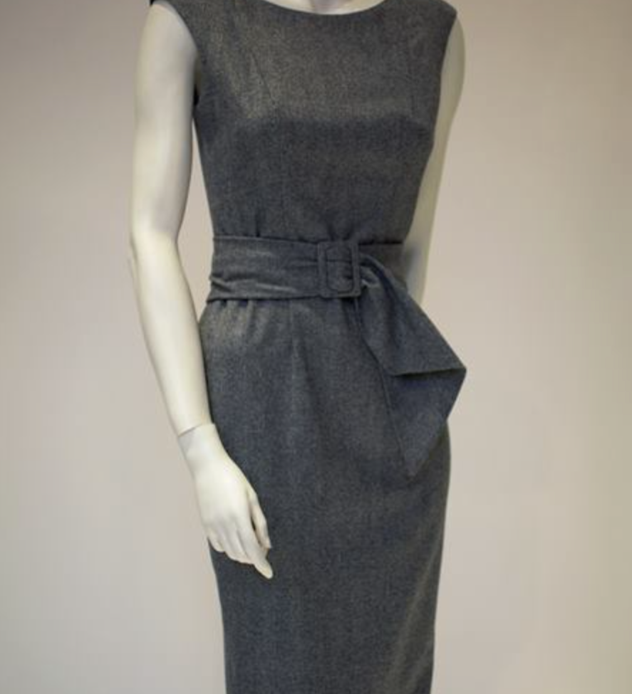 Grey herringbone wool cashmere shift dress on a mannequin with matching waterfall belt
